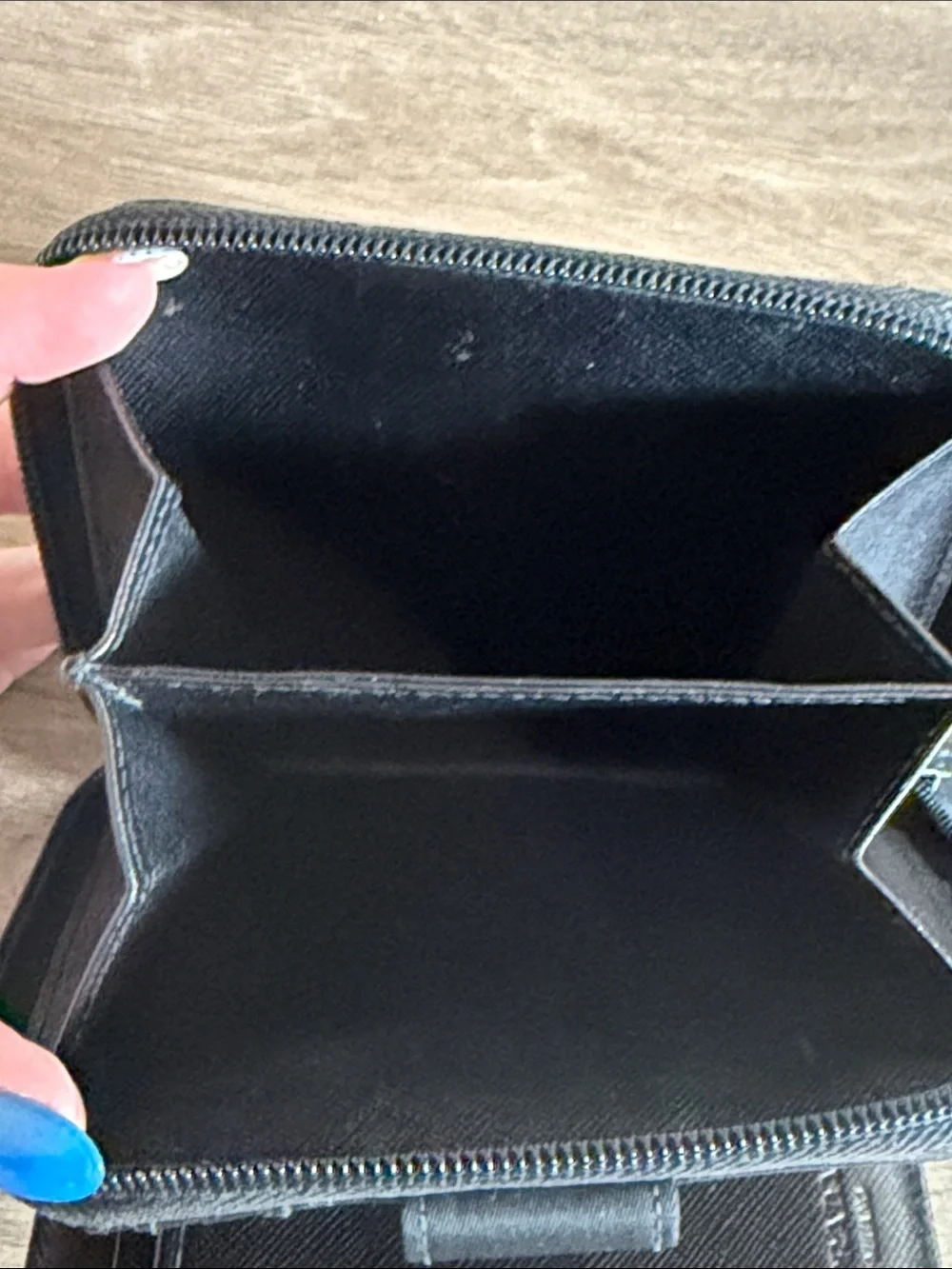 Prada Bifold  Black Zip-Around Card Wallet with Silver Triangle Emblem